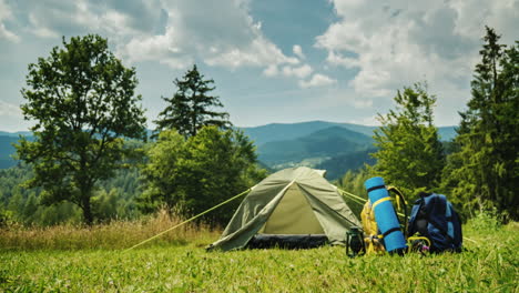 tourist tent and two backpacks