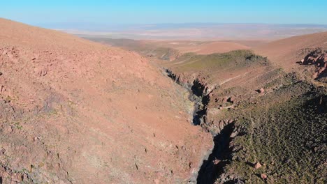 Aerial-View-of-popular-giant-cactus-canyon-near-San-Pedro-de-Atacama-in-the-Atacama-Desert,-northern-Chile,-South-America