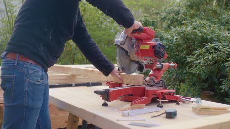 cutting off a small piece of wood with a circular saw