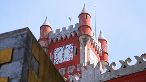 The-Sintra-Palace-tower-with-a-clock-shot-from-below,-architecture,-buildings-in-Portugal,-castle,-clear-sunny-day