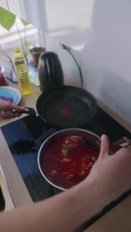woman cooking borcht