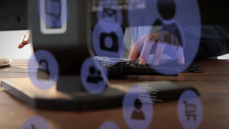 animación de iconos de redes sociales digitales sobre la sección media de un hombre usando una computadora