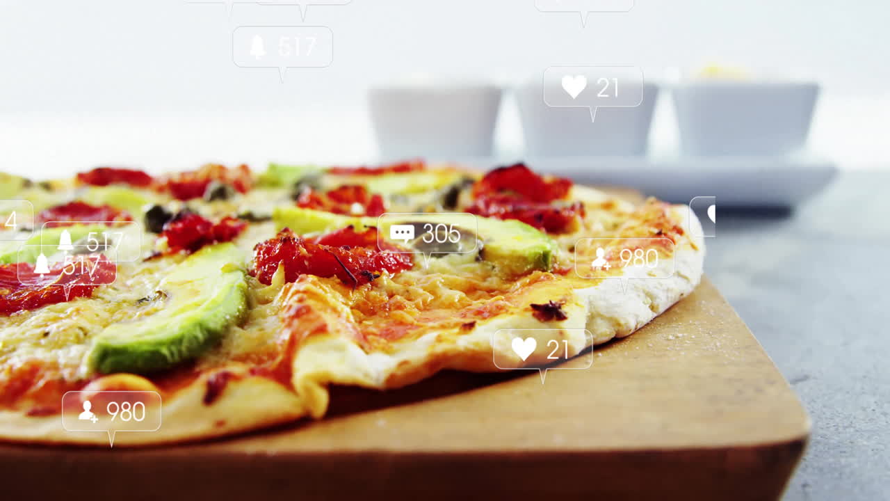 Pizza with various toppings and social media likes animation over it