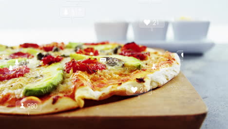 pizza with various toppings and social media likes animation over it
