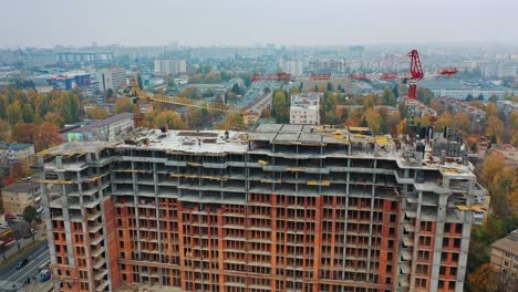 construction site of modern multi-storey building in the city. aerial panoramic view on a construction of a new building.