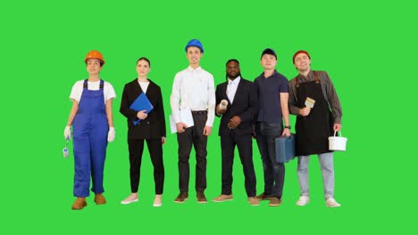 people, profession, qualification, employment and success concept on a green screen, chroma key