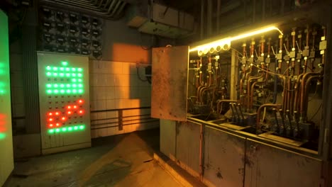 abandoned industrial control room