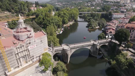 Church-and-Sao-Goncalo-Bridge-over-the-Tamega-River,-Amarante,-Portugal