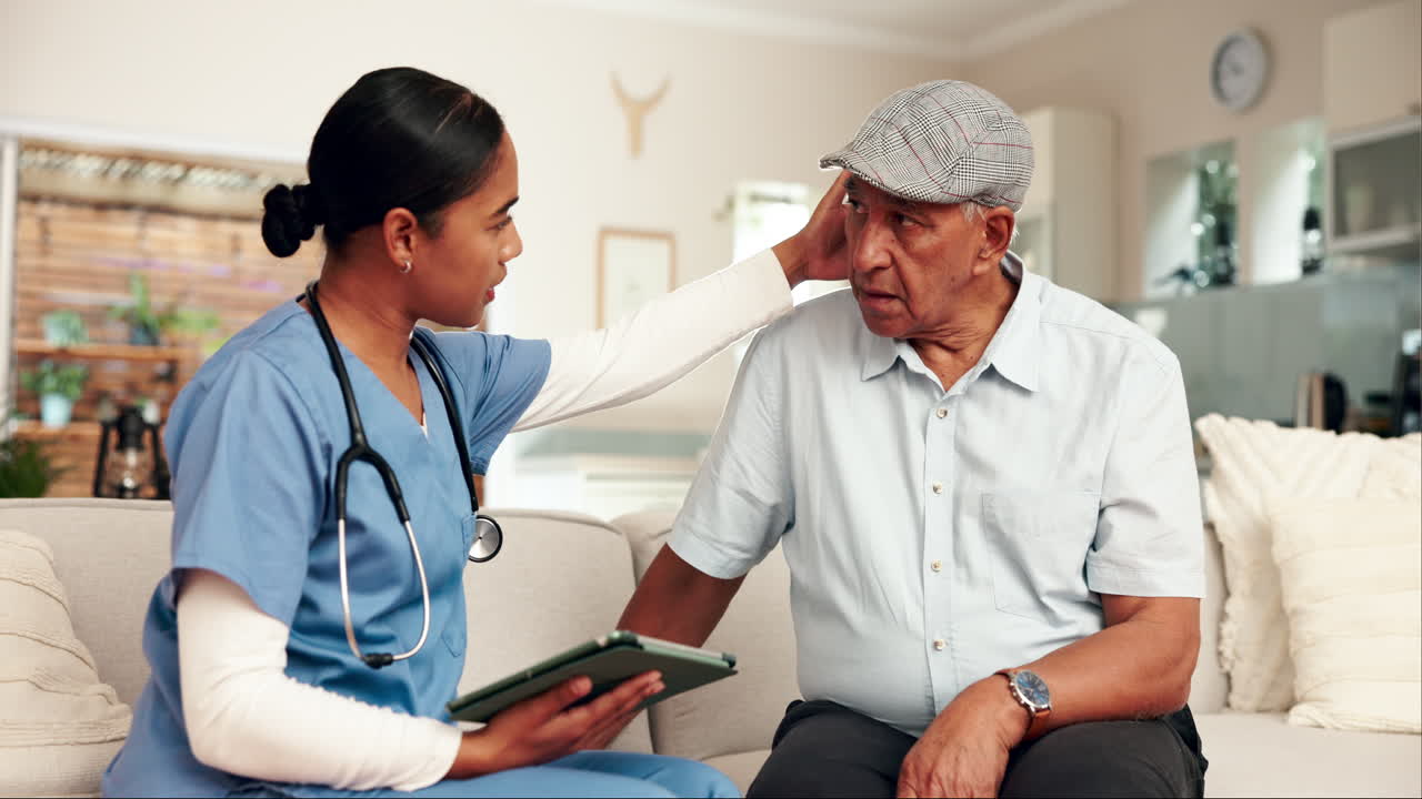 Doctor visiting senior patient at home
