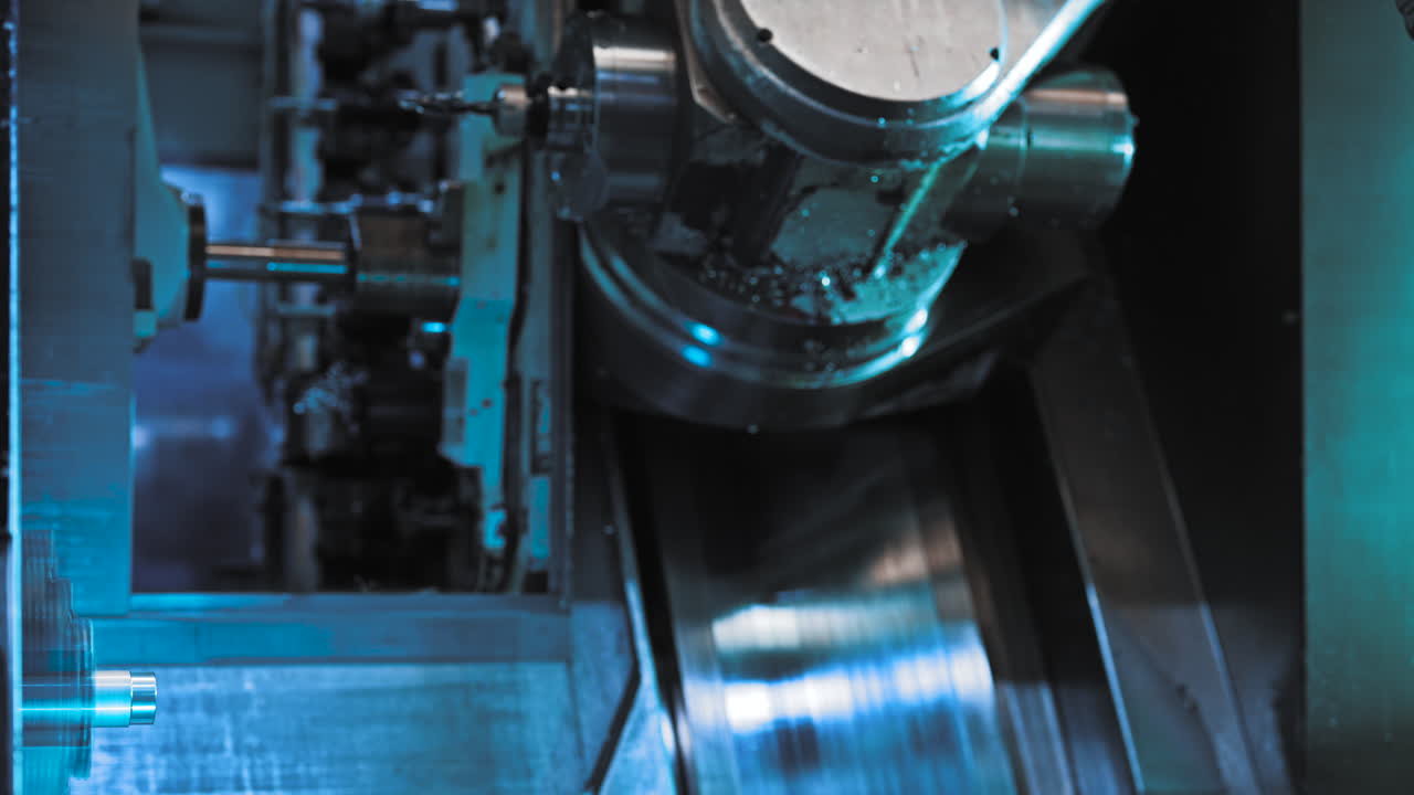 High-tech industrial automation process is perfect for showcasing advanced engineering, precision machining, and modern manufacturing technology. Tool revolver changes milling heads.