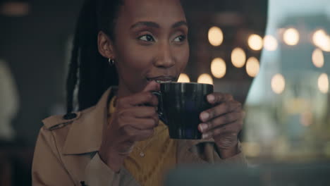 black woman, tea and thinking with smile