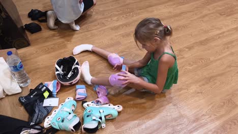 child getting ready for roller skating