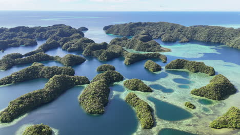 cinematic aerial footage showcasing remote islands around palau and tropical waters. wide drone shot
