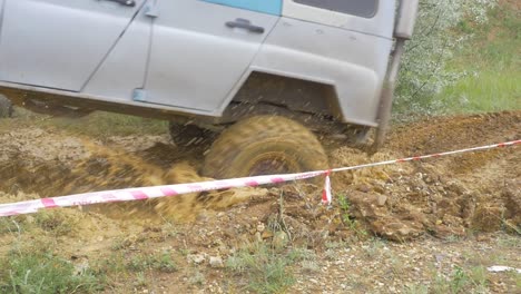 off-road vehicle in a muddy terrain