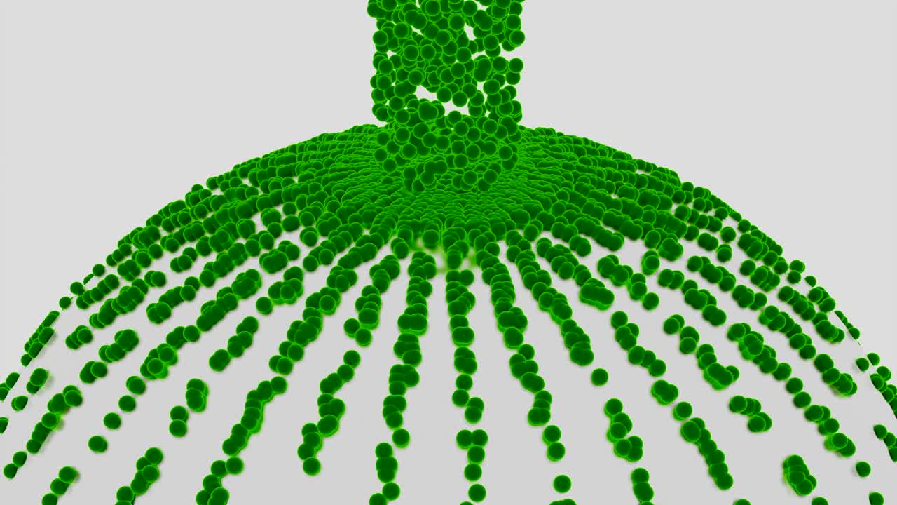Green Spheres Accumulating on a White Surface