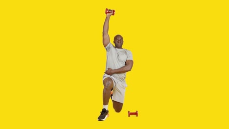 african man doing triceps extension exercises with dumbbells