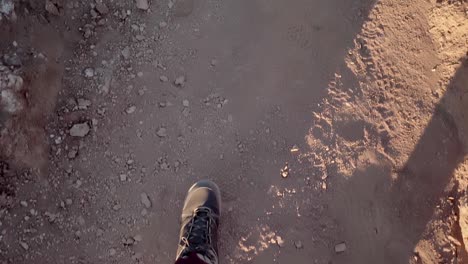 first person view of walking on desert mountains at sunrise