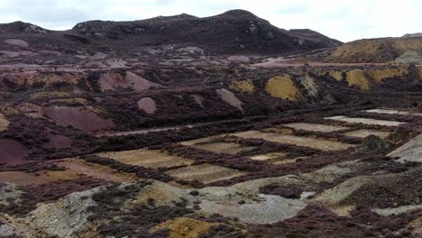 parys mountain abandoned historic copper mining industry alien landscape aerial view dolly right forward