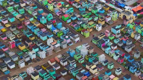 Colorful-Tombs-At-The-Cemetery-at-Sumpango-Guatemala,-aerial