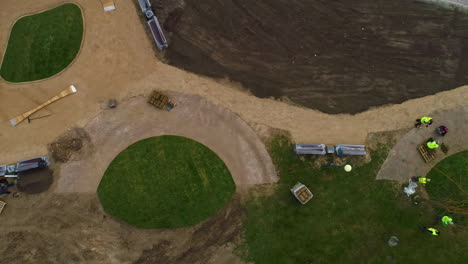 Aerial-view-of-people-working-in-Uzvaras-Park,-Riga,-Latvia