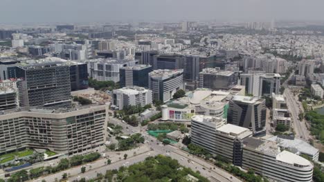 aerial footage on a sunday morning, the roads of the developing smart city have less traffic