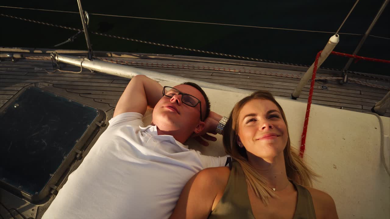 Couple Relaxing on a Yacht Deck