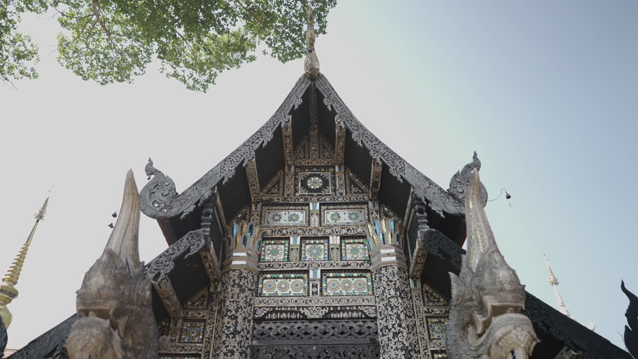 Ornate Buddhist Temple Facade with Intricate Carvings