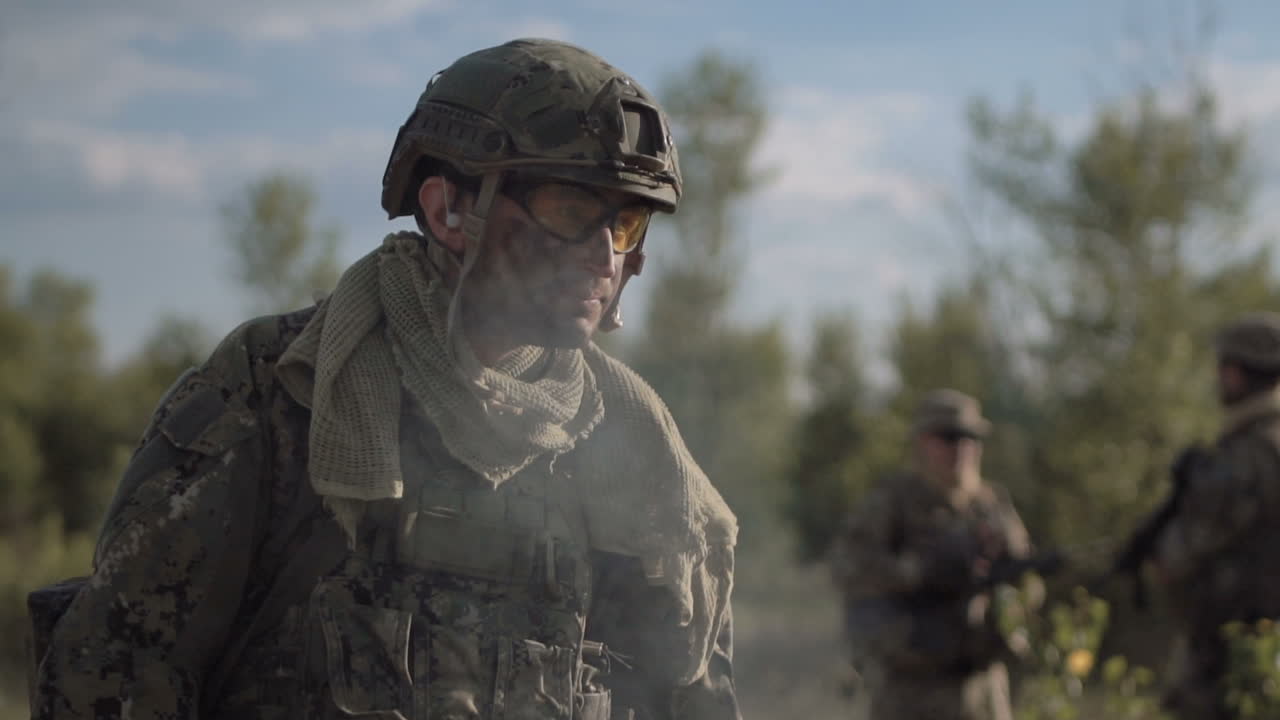 Military soldiers in outdoor combat zone