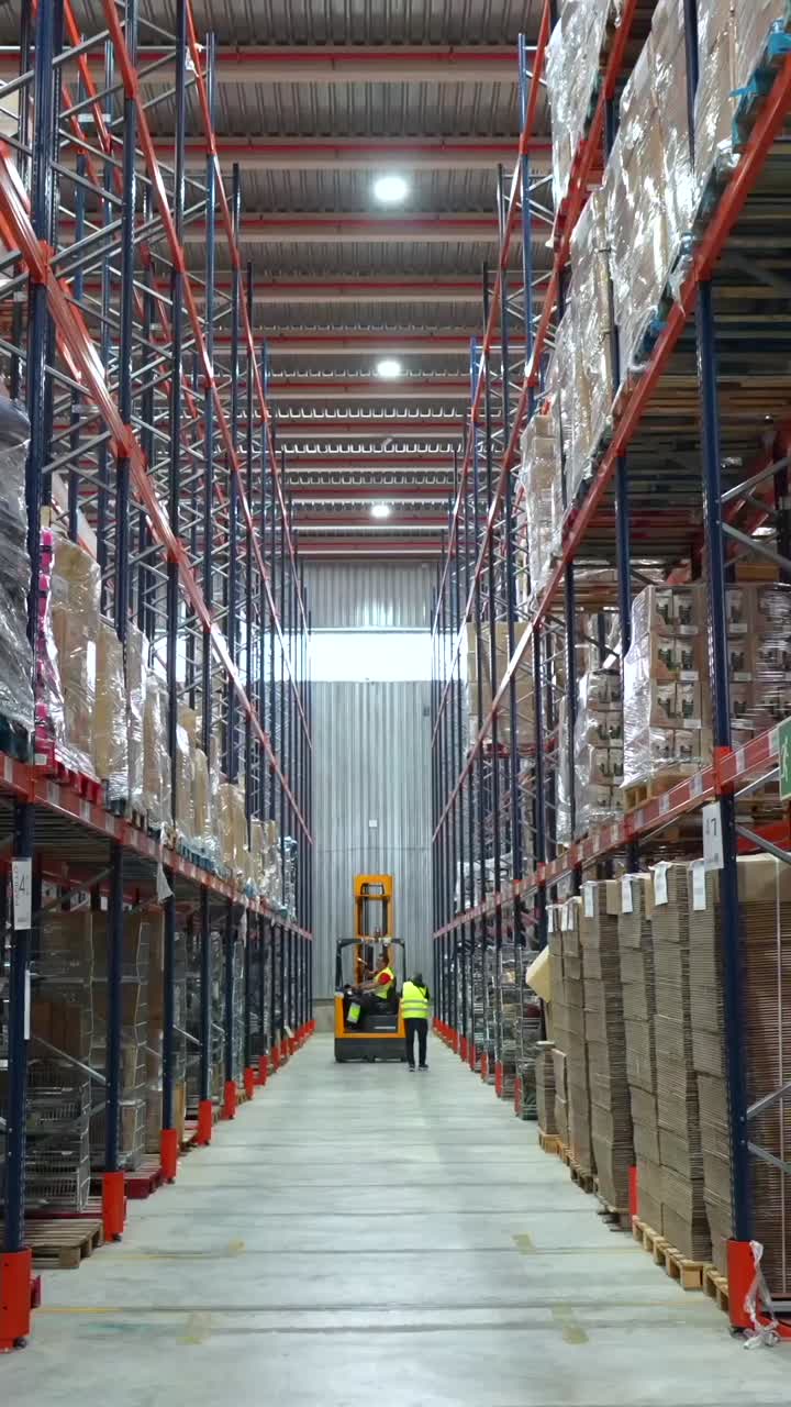 Warehouse with Forklift and Worker