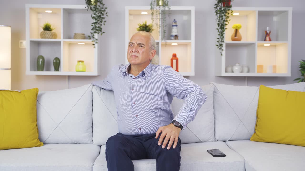 The old man waiting helplessly at home. No one is coming and he is alone.