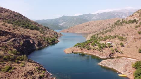 drin river and gorge at road to lake koman, albania - aerial view