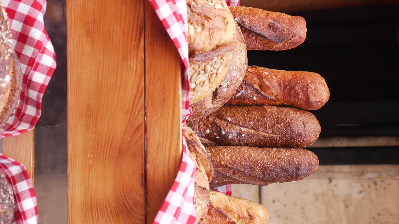 Assortment of Freshly Baked Artisan Breads in a Rustic Display