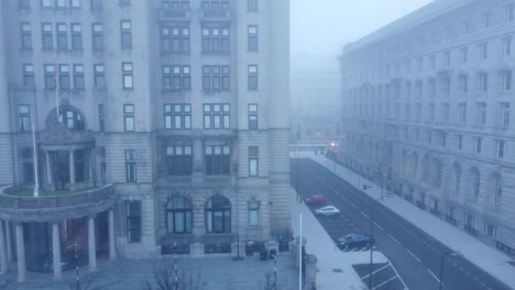 ghostly dense city fog aerial view across chilling downtown magical skyline tracking left shot