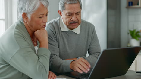 Discussion, computer and senior couple in kitchen