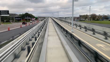 Tampa-Bay,-Florida---December-17,-2020:-Riding-on-the-airport-transit-train-to-the-departure-terminal