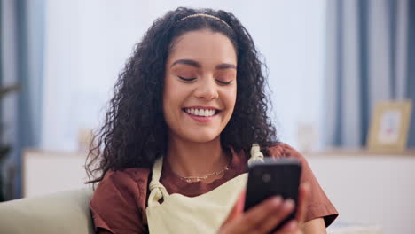 woman using phone and smiling