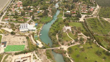 aerial view of a town alongside a river