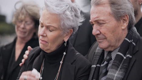 death, funeral and senior couple crying together