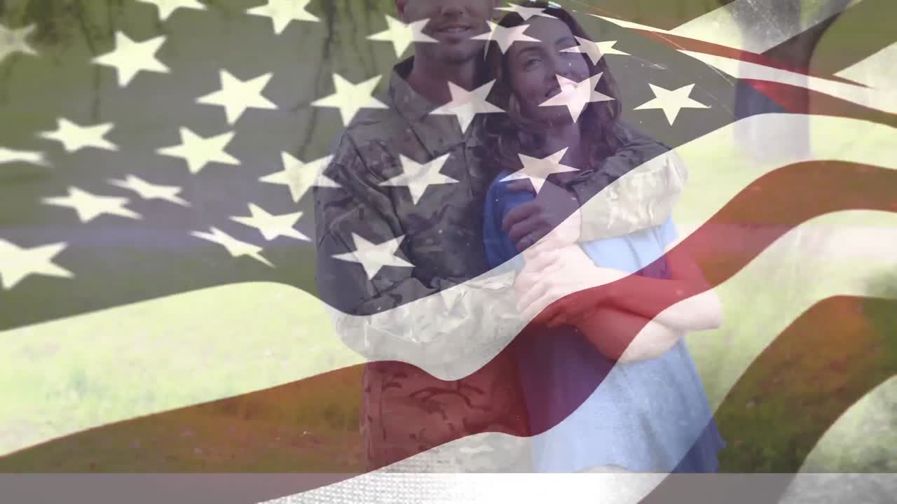 nosotros soldado sosteniendo esposa con nosotros bandera ondeando en primer plano