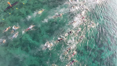 aerial shot of a swimming leg in a marathon race