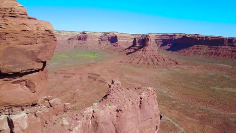 amazing rising aerial through the buttes and rock formations of monument valley utah 1