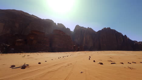 desert landscape with rocky mountains and sand road