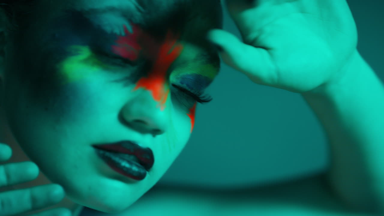 Woman, creative and neon lights for makeup