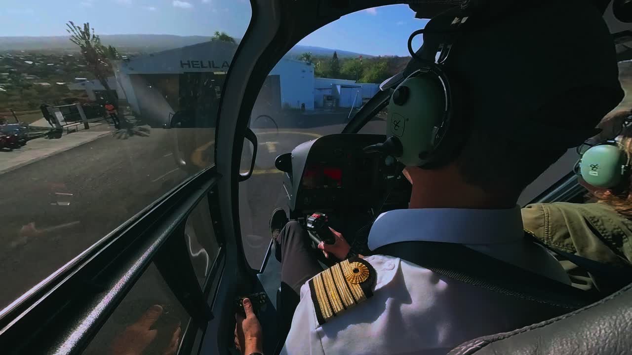 A thrilling view of a helicopter landing at the base after an incredible scenic flight around the breathtaking landscapes of Reunion Island.