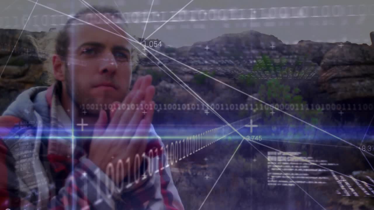Male hiker standing riverbank as data streams sliding in and powering animated terrain mapping tech