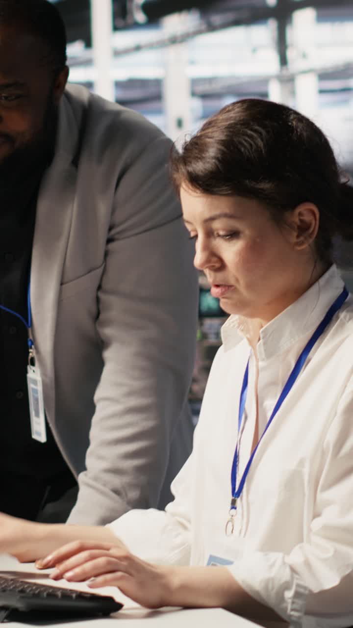 Vertical video Joyous data center team leader giving high five to worker