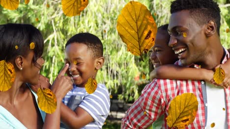 Animation-of-falling-yellow-over-african-american-family