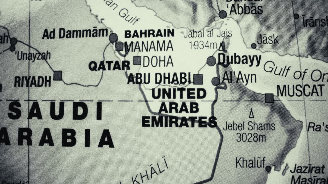 A close-up, monochrome map of the Arabian Peninsula, showing countries like Saudi Arabia, UAE, Qatar, Bahrain, Kuwait, and Oman