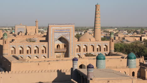 aerial drone point of the itchan kala and islam khodja minaret at old walled city of khiva in uzbekistan