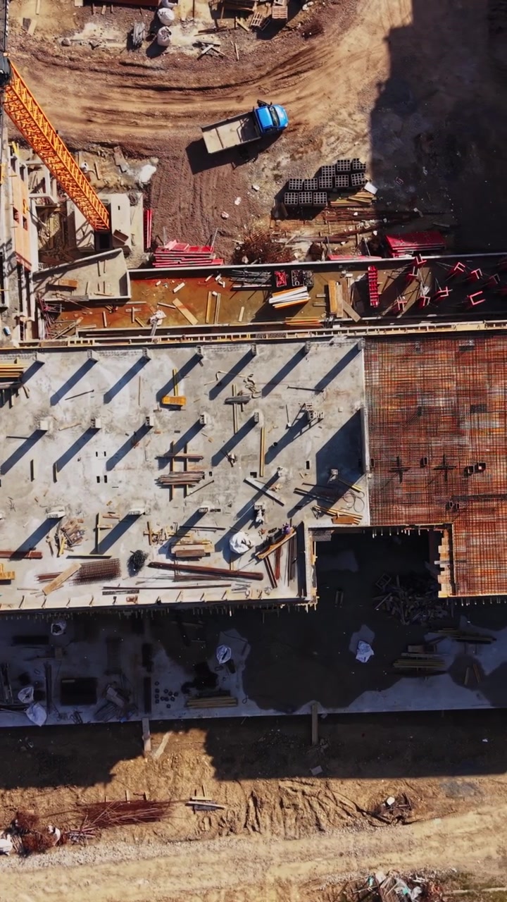 Aerial view of a tower crane at a construction site